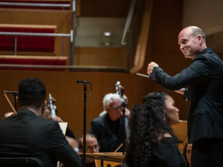 photo depicts Robert Istad conducting